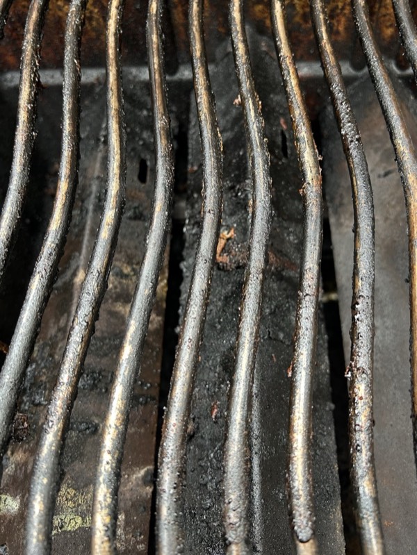 Dirty BBQ grates before cleaning